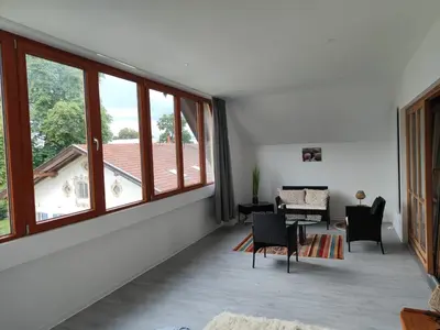 Ein Sitzbereich in der Unterkunft Ferienwohnung Bruckmühle