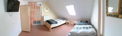 Ein Bett oder Betten in einem Zimmer der Unterkunft Ferienwohnung Dorfzauber