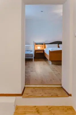 Ein Bett oder Betten in einem Zimmer der Unterkunft Ferienwohnung Jelen - Kaffee - Tee - Lichthof - 135 qm