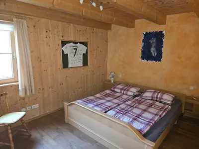 Ein Bett oder Betten in einem Zimmer der Unterkunft Ferienhaus Faistenau