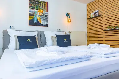 Ein Bett oder Betten in einem Zimmer der Unterkunft SMS-Homes I Auszeit in der Altstadt
