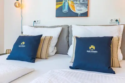 Ein Bett oder Betten in einem Zimmer der Unterkunft SMS-Homes I Auszeit in der Altstadt