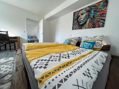 Ein Bett oder Betten in einem Zimmer der Unterkunft Stilvolle, große Ferienwohnung in der Hallertau, Nähe Pfaffenhofen & Scheyern