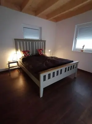 Ein Bett oder Betten in einem Zimmer der Unterkunft Tinyhouse für Gesundheitsbewusste