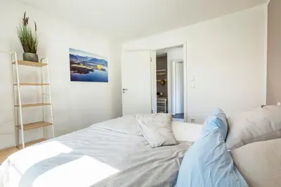 Ein Bett oder Betten in einem Zimmer der Unterkunft Ferienwohnung Buchwald