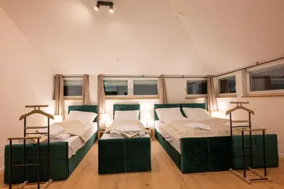 Ein Bett oder Betten in einem Zimmer der Unterkunft Munich Large Apartment 155 qm with 4 Bedrooms top located 1 to 12 guests