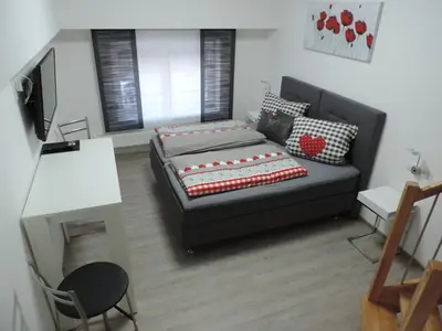 Ein Bett oder Betten in einem Zimmer der Unterkunft Pension am Kirchberg
