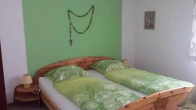 Ein Bett oder Betten in einem Zimmer der Unterkunft Ferienhaus Lang