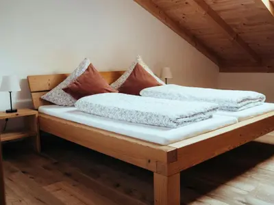 Ein Bett oder Betten in einem Zimmer der Unterkunft Eberlhof
