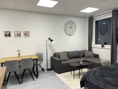Ein Sitzbereich in der Unterkunft SweetHome - Studio Apartment Ergolding