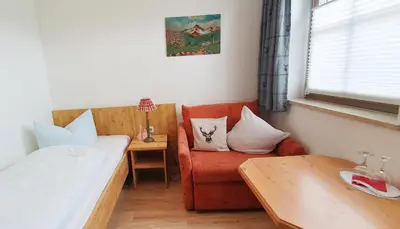 Ein Bett oder Betten in einem Zimmer der Unterkunft Pension Steiner