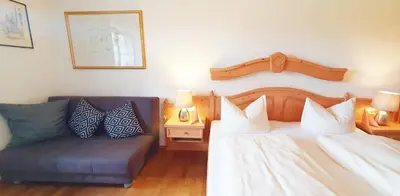 Ein Bett oder Betten in einem Zimmer der Unterkunft Pension Steiner