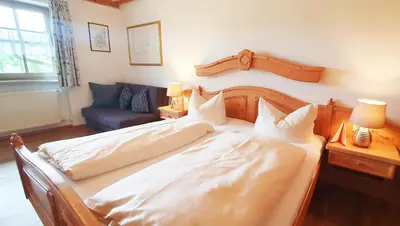Ein Bett oder Betten in einem Zimmer der Unterkunft Pension Steiner
