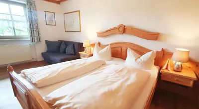 Ein Bett oder Betten in einem Zimmer der Unterkunft Pension Steiner
