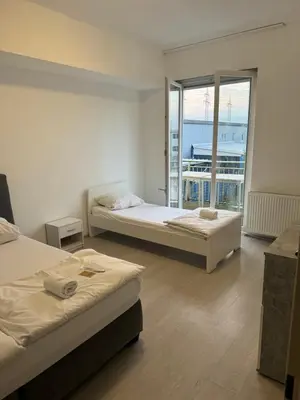 Ein Bett oder Betten in einem Zimmer der Unterkunft Shirdel Pension