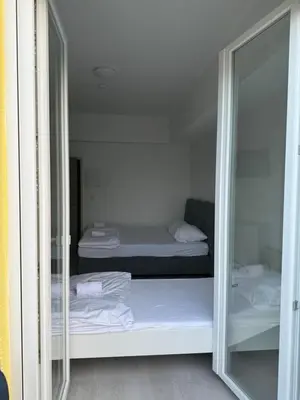 Ein Bett oder Betten in einem Zimmer der Unterkunft Shirdel Pension