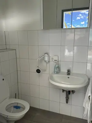 Ein Badezimmer in der Unterkunft Shirdel Pension