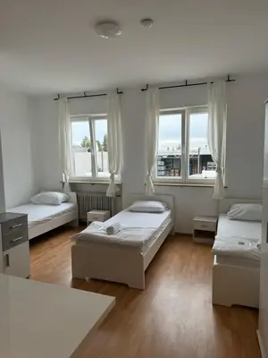 Ein Bett oder Betten in einem Zimmer der Unterkunft Shirdel Pension