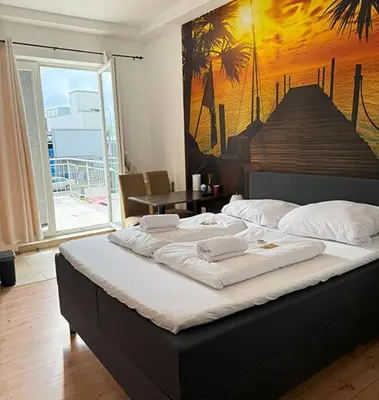 Ein Bett oder Betten in einem Zimmer der Unterkunft Shirdel Pension