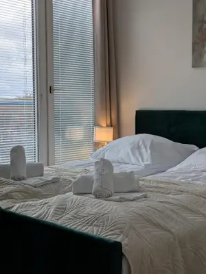 Ein Bett oder Betten in einem Zimmer der Unterkunft Munich Large Apartment 110 qm, 3 Bedrooms and very Central 1-12 Guests