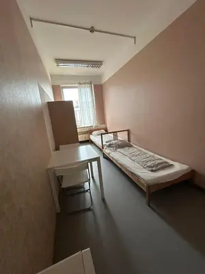 Ein Bett oder Betten in einem Zimmer der Unterkunft 2-Rent Group Hostel Rooms&Apartments GKP2