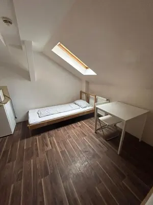 Ein Bett oder Betten in einem Zimmer der Unterkunft 2-Rent Group Hostel Rooms&Apartments GKP2
