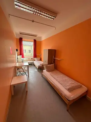 Ein Bett oder Betten in einem Zimmer der Unterkunft 2-Rent Group Hostel Rooms&Apartments GKP2