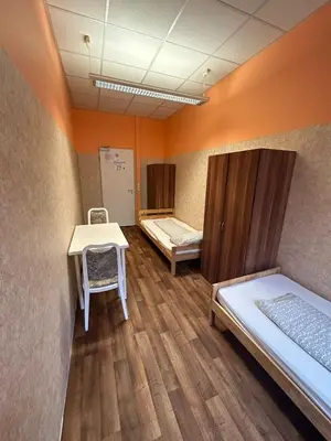 Ein Bett oder Betten in einem Zimmer der Unterkunft 2-Rent Group Hostel Rooms&Apartments GKP2