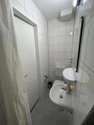 Ein Badezimmer in der Unterkunft 2-Rent Group Hostel Apartments SEN14
