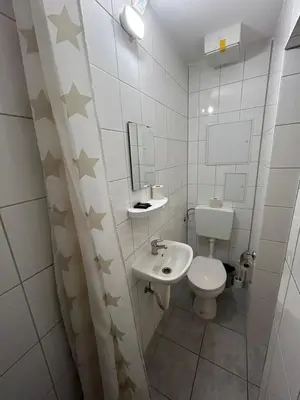 Ein Badezimmer in der Unterkunft 2-Rent Group Hostel Apartments SEN14