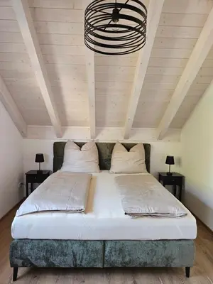 Ein Bett oder Betten in einem Zimmer der Unterkunft Moderne,ruhige Ferienwohnung in Eicherloh