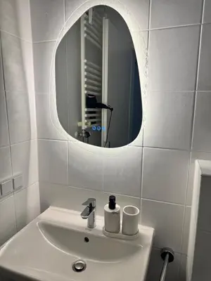 Ein Badezimmer in der Unterkunft Modern City Apartment 1