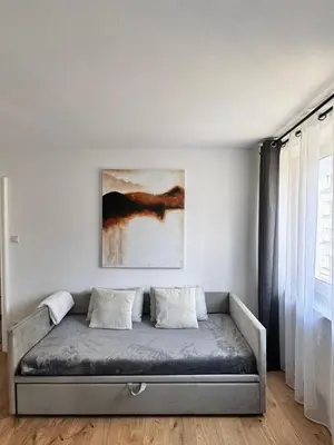 Ein Bett oder Betten in einem Zimmer der Unterkunft Modern City Apartment 1