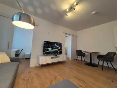 TV/Unterhaltungsangebot in der Unterkunft Modern City Apartment 1