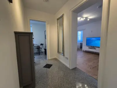 TV/Unterhaltungsangebot in der Unterkunft Modern City Apartment 1