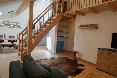 Ein Sitzbereich in der Unterkunft Loftwohnung Kaiserblick im Inntal - 83 qm - zentral & ruhig