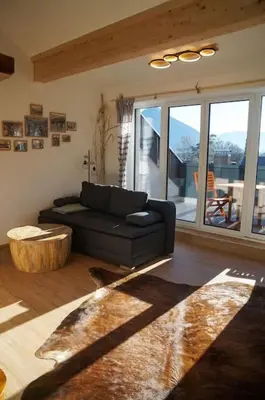 Ein Sitzbereich in der Unterkunft Loftwohnung Kaiserblick im Inntal - 83 qm - zentral & ruhig