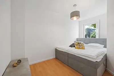 Ein Bett oder Betten in einem Zimmer der Unterkunft 3 Zimmer EG Wohnung direkt am Kurpark