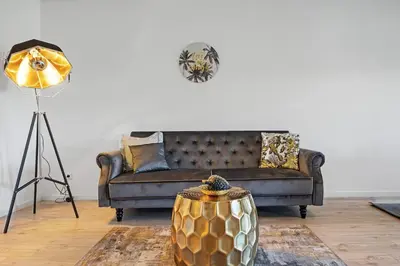 Ein Sitzbereich in der Unterkunft 3 Zimmer EG Wohnung direkt am Kurpark