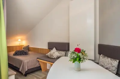 Ein Bett oder Betten in einem Zimmer der Unterkunft Lebensart am See
