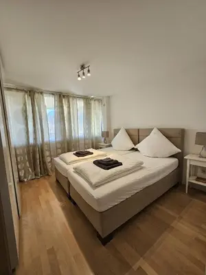 Ein Bett oder Betten in einem Zimmer der Unterkunft OEZ 3 Zimmer Wohnung