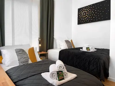 Ein Bett oder Betten in einem Zimmer der Unterkunft LeNi Living - Klein! Fein! Dein!