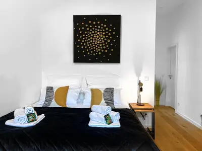 Ein Bett oder Betten in einem Zimmer der Unterkunft LeNi Living - Klein! Fein! Dein!