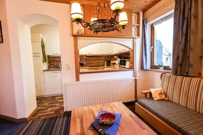 Ein Sitzbereich in der Unterkunft Ferienhaus Rosengarten