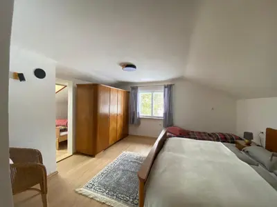 Ein Bett oder Betten in einem Zimmer der Unterkunft Ferienwohnung im bayerischen Inntal