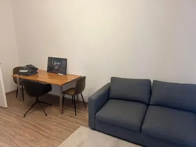Ein Sitzbereich in der Unterkunft 2 Zimmer Wohnung an der Isar