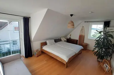 Ein Bett oder Betten in einem Zimmer der Unterkunft Landidylle im Münchner Umland
