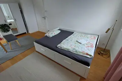 Ein Bett oder Betten in einem Zimmer der Unterkunft Landidylle im Münchner Umland