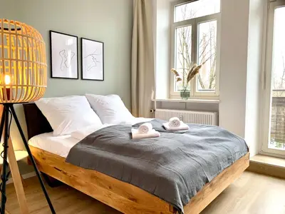 Ein Bett oder Betten in einem Zimmer der Unterkunft Cozy one bedroom apartment in Augsburg