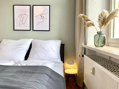 Ein Bett oder Betten in einem Zimmer der Unterkunft Cozy one bedroom apartment in Augsburg